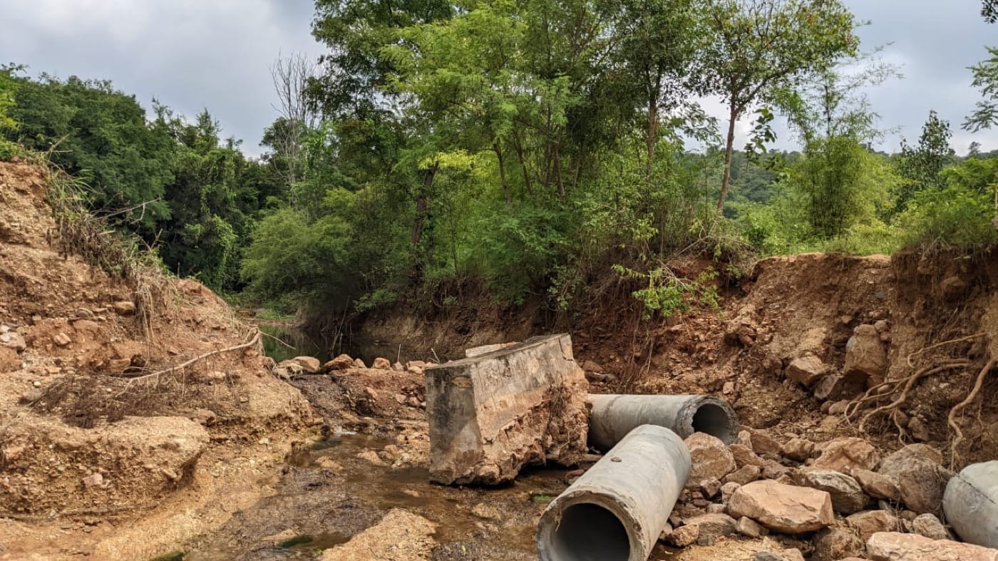 Another unusually heavy downpour washed out the reinforced bund — the same spot lost back in 2017.